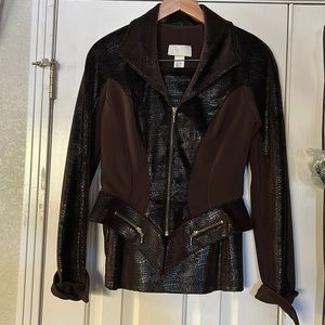 Cach’e unique after five suit, size 10 in new like condition $75.00.